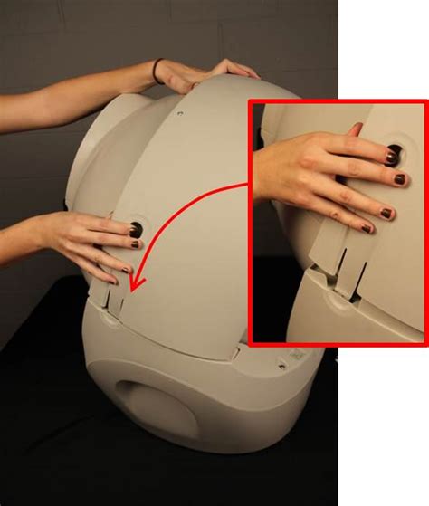 Reattach the <b>bonnet</b> starting with the back-left tab, then the back-right tab, and finally the two on the sides. . Litter robot 3 bonnet removed